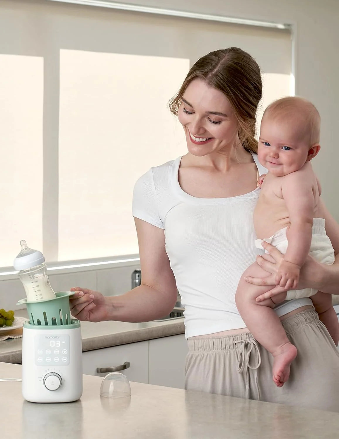 Momcozy Nutri Smart аналоген, мултифукнционален грејач за шишиња