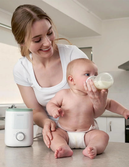 Momcozy Nutri Smart аналоген, мултифукнционален грејач за шишиња